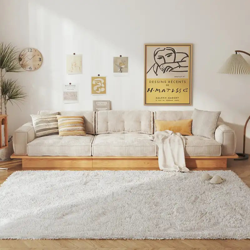 Canapé en velours côtelé beige avec cadre en bois